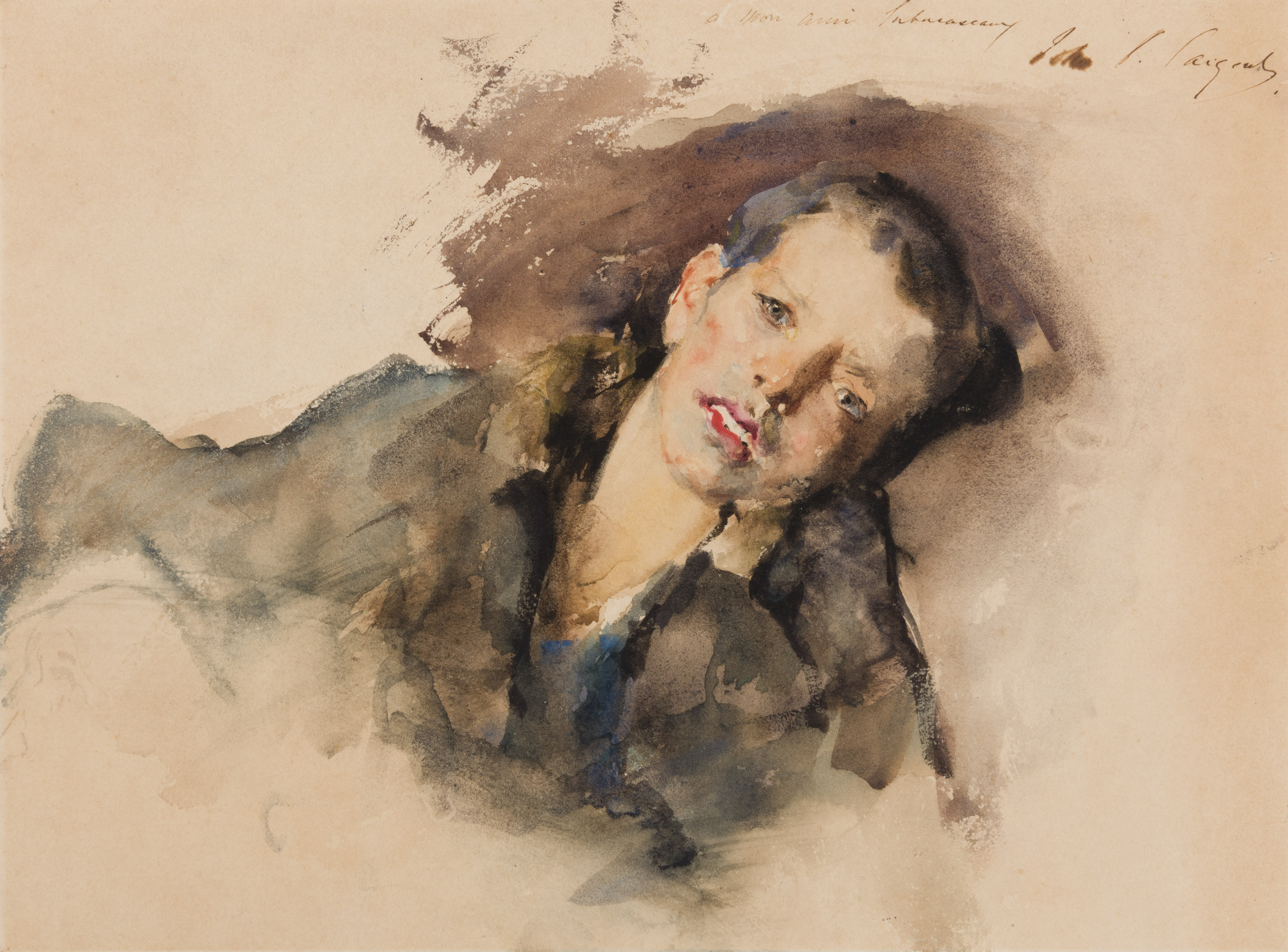 A Young Boy Lying on a Cushion